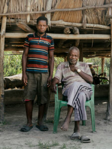 Jean-Paul Ikolongo Sefala Yekay, seated, the chief of the riverine village of Mpeka. Photography by Nanna Heitmann