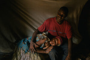 Therese Bokinga, with her husband, lives in Lokolama and looks after Mr. Emba, the researcher, when he visits. Photography by Nanna Heitmann